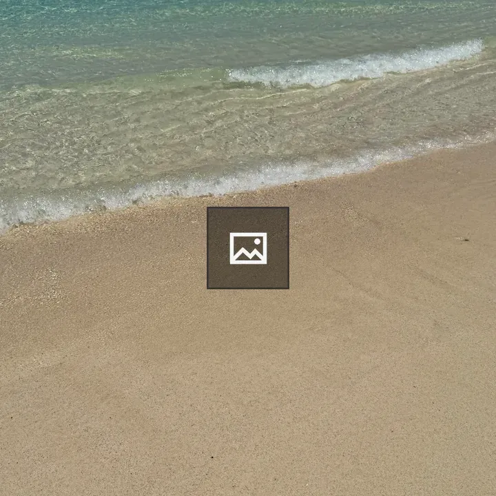 Small wave on sandy beach