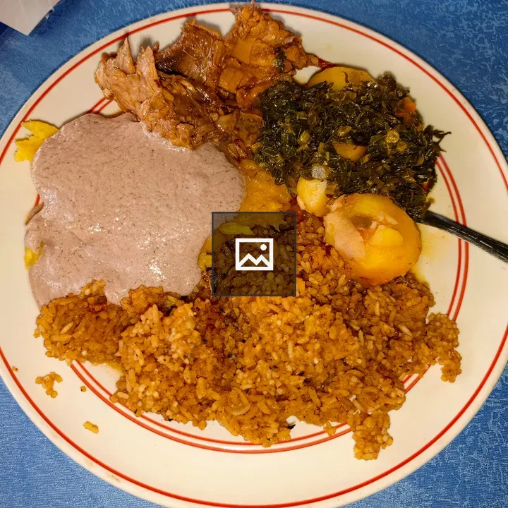 Spiced rice with beef and greens plate