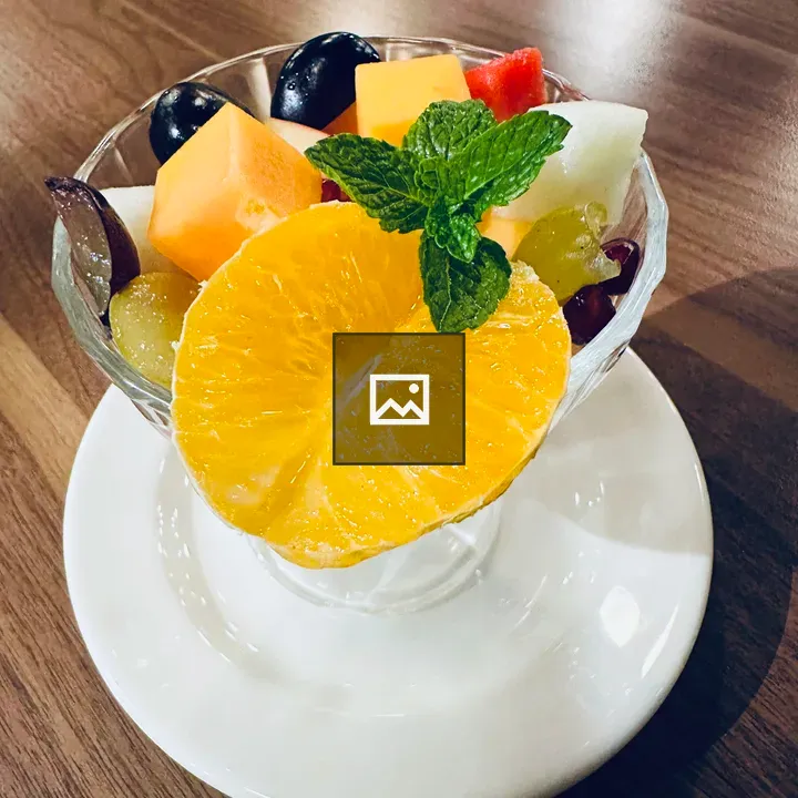 Glass with assorted fresh fruit dessert