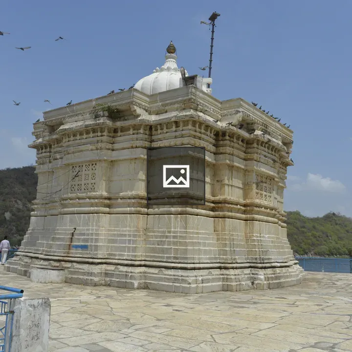 White stone monument with blue sky