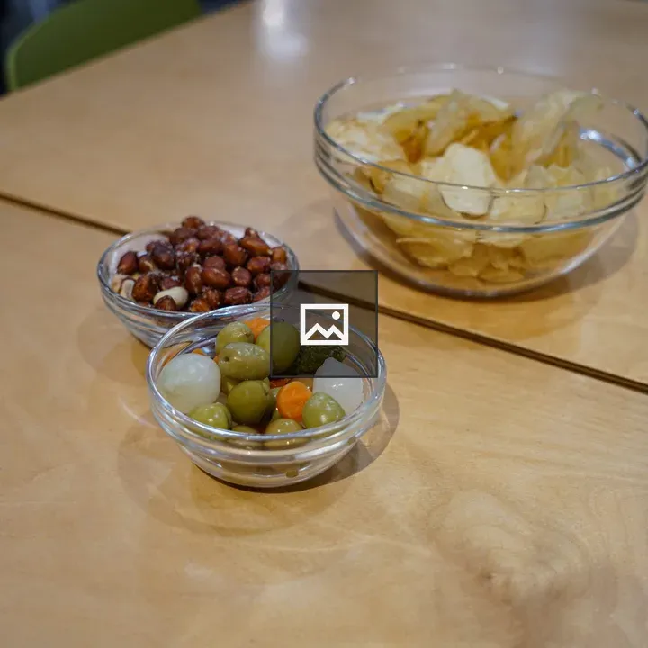 Three Glass Bowls of Snacks