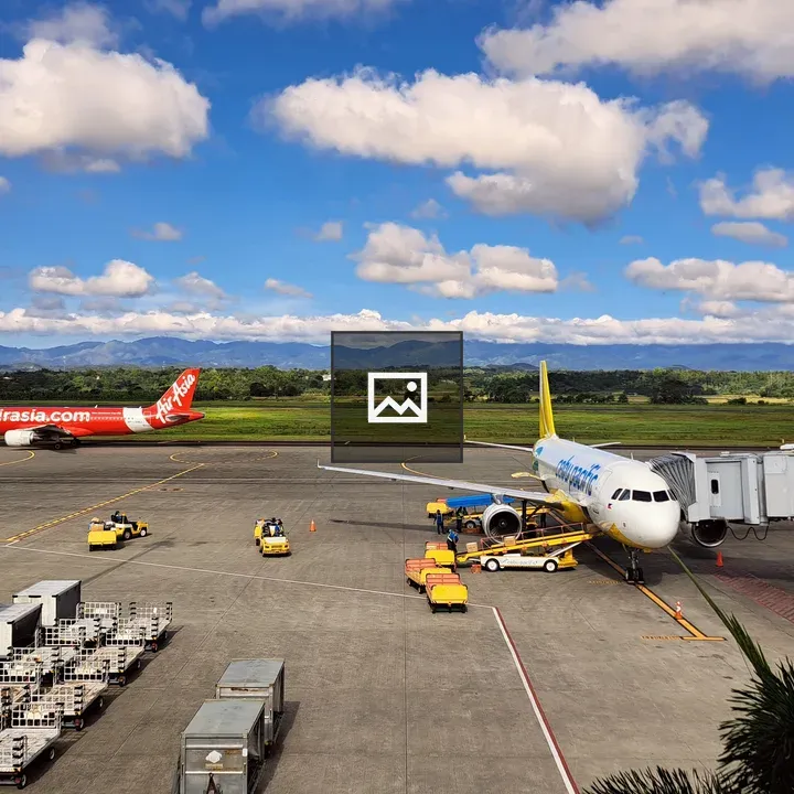 Commercial airplane taxiing on runway