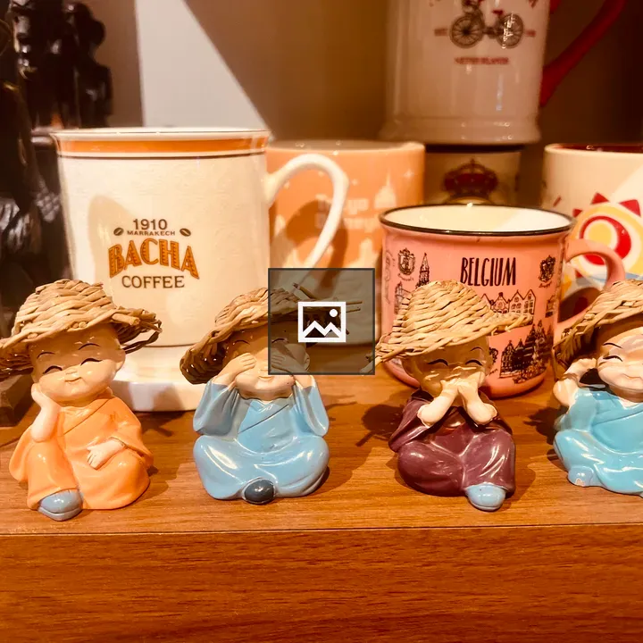 Monk figurines on shelf
