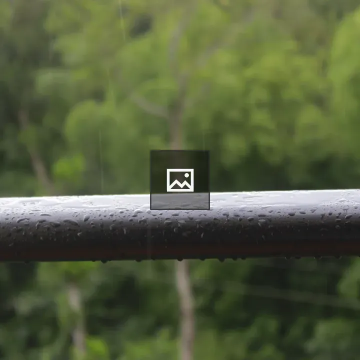 Wet metal railing close-up