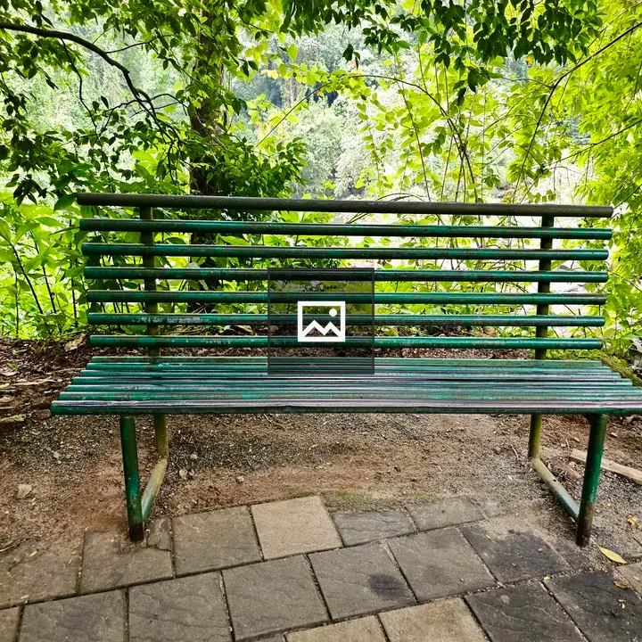 Green metal bench