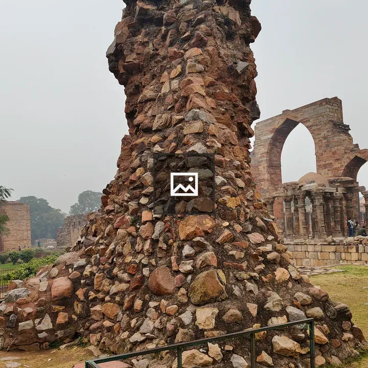 Weathered stone arches and pillars