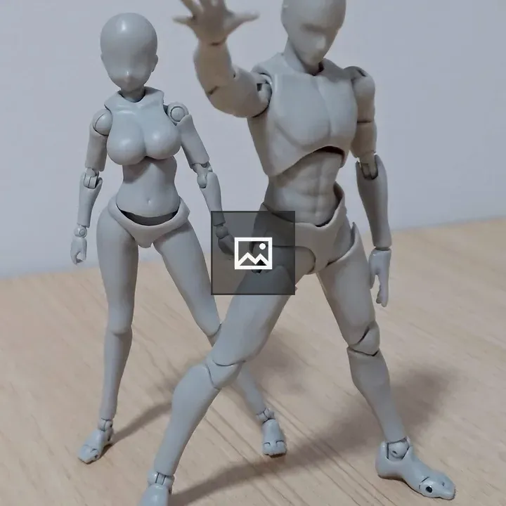 Toy figurines of a man and a woman