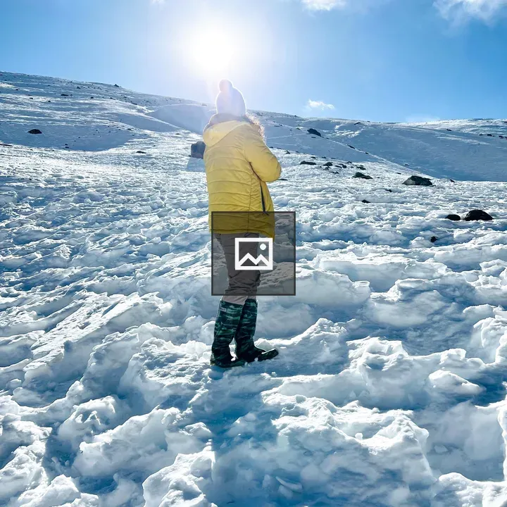 Snow background with hiker