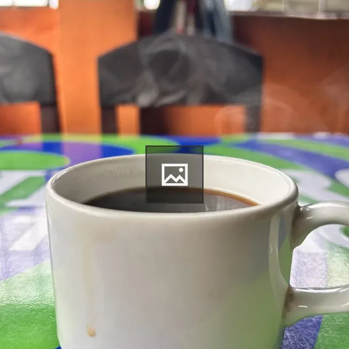 Black coffee in a white cup