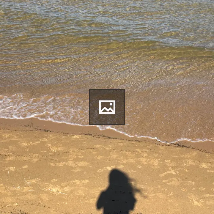 Shadow of the girl at the beach