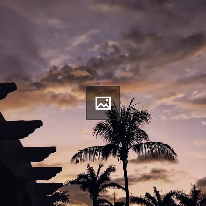 Silhouetted Palm Trees at Twilight