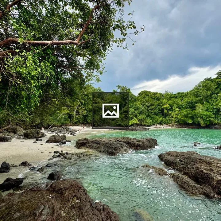 Turquoise Cove by Dark Rocks