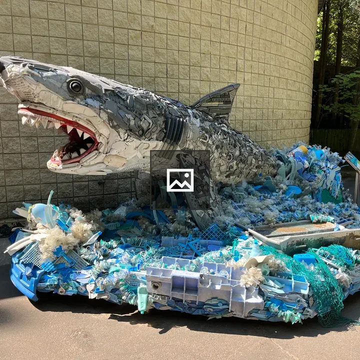 Shark sculpture made of trash