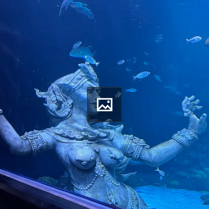 Statue in Blue Aquarium
