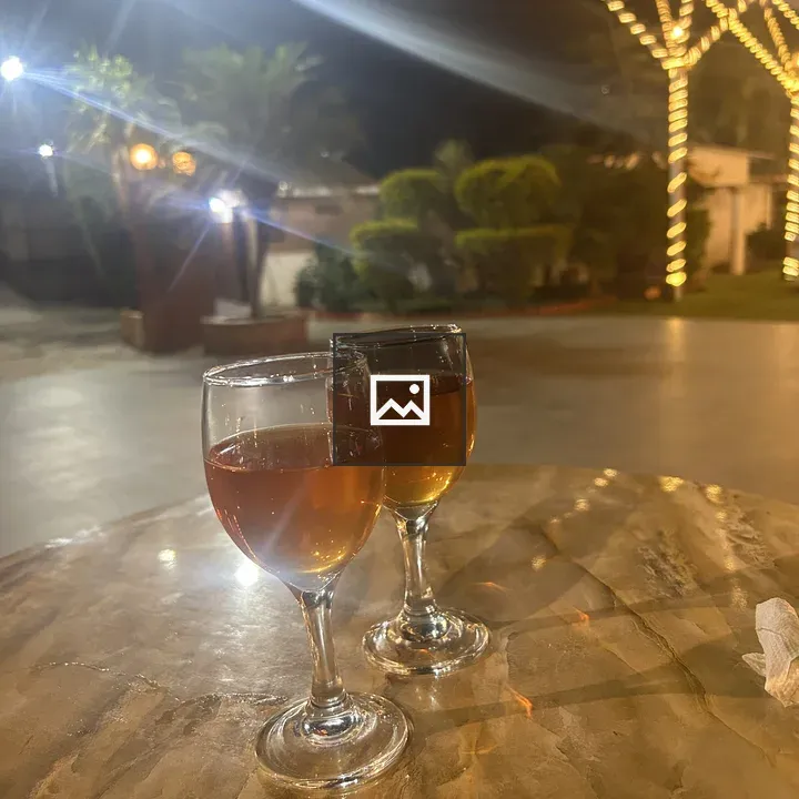 Two wine glasses on table