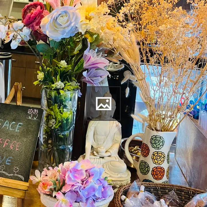 Display with Faux Florals and Buddha