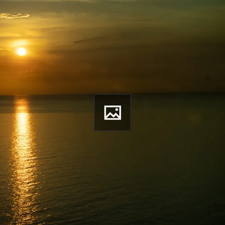 Sunset Over Ocean Horizon