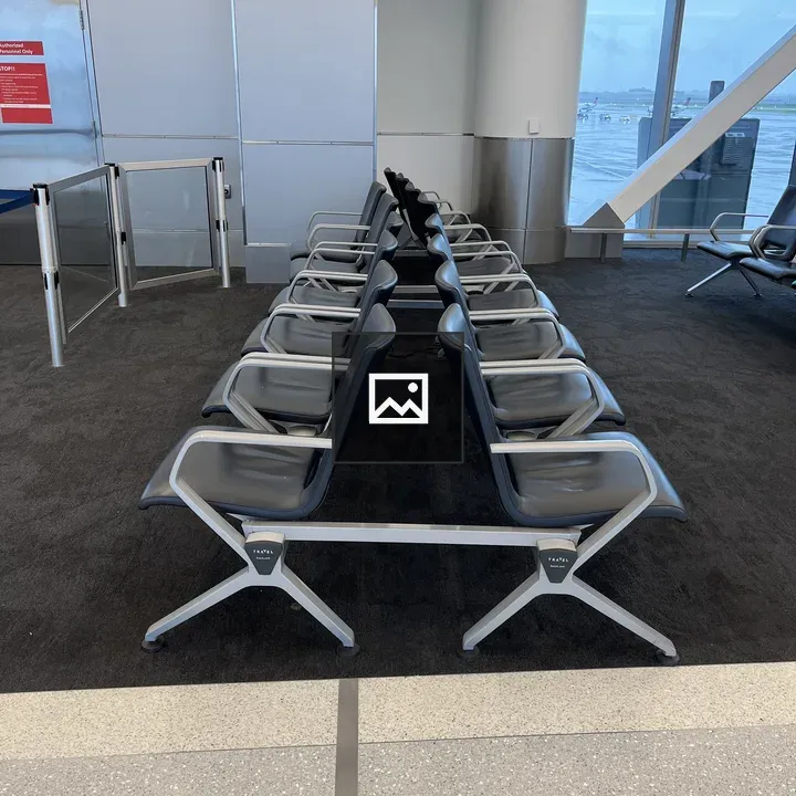 Row of empty airport chairs