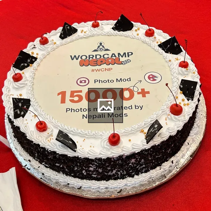 Round cake with WordCamp Nepal label