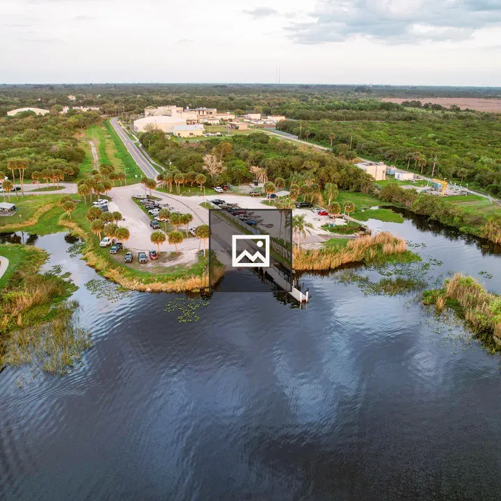 Aerial view of boat ramp and water plant