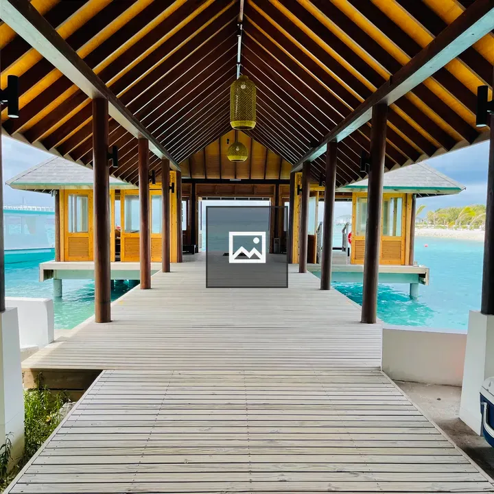 Wooden walkway over turquoise water