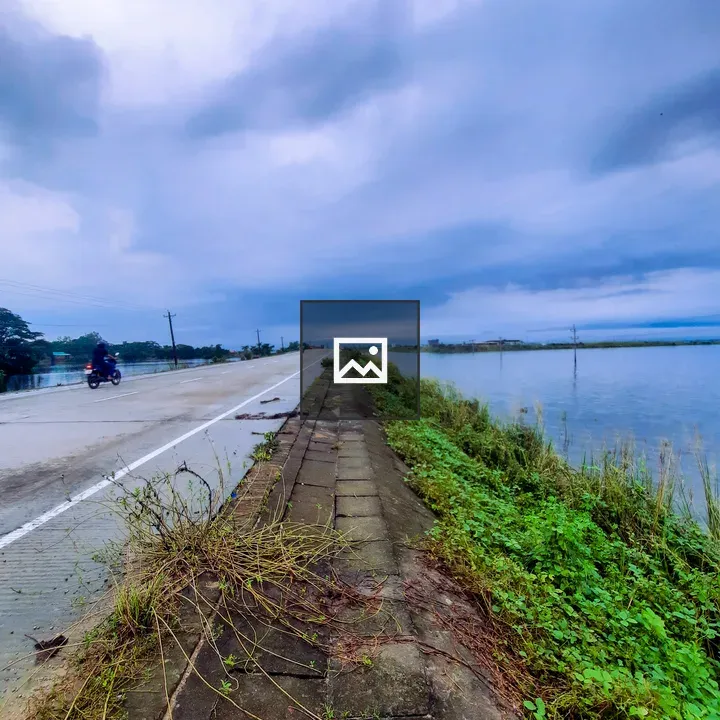 Empty road beside the river