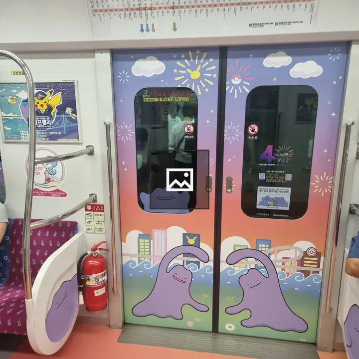 Colorful subway door with cartoon figures