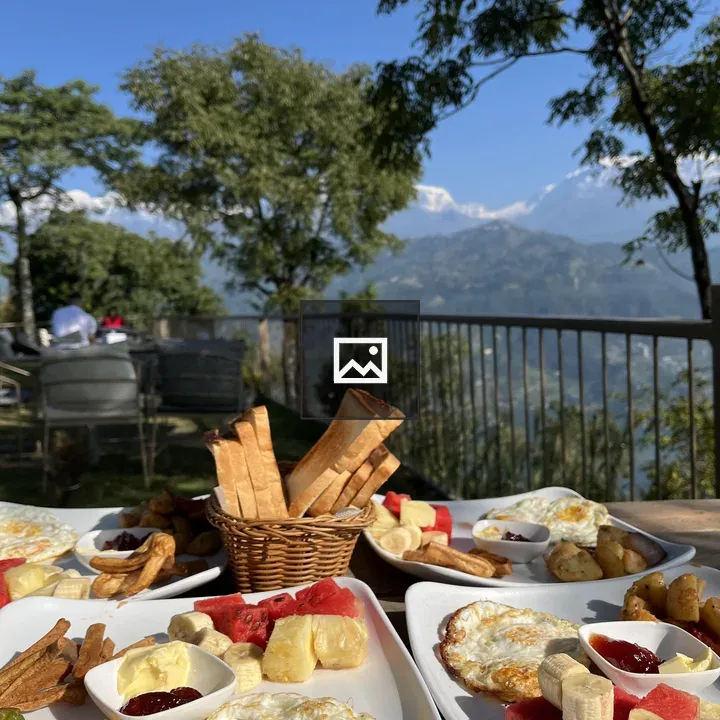 Outdoor breakfast with eggs and fruit
