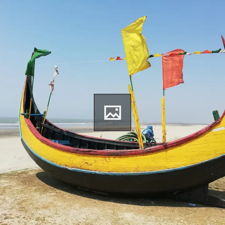 Colorful wooden boat with flags
