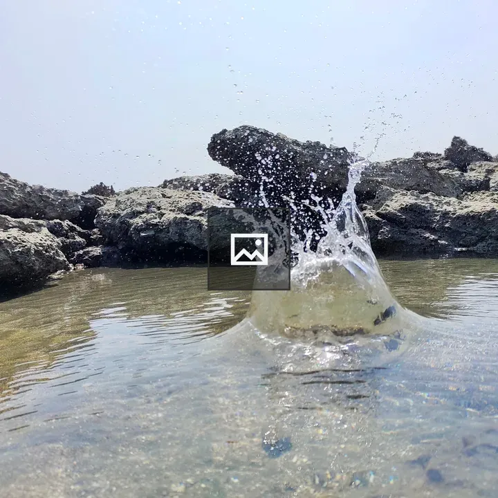 Clear water splash at the beach