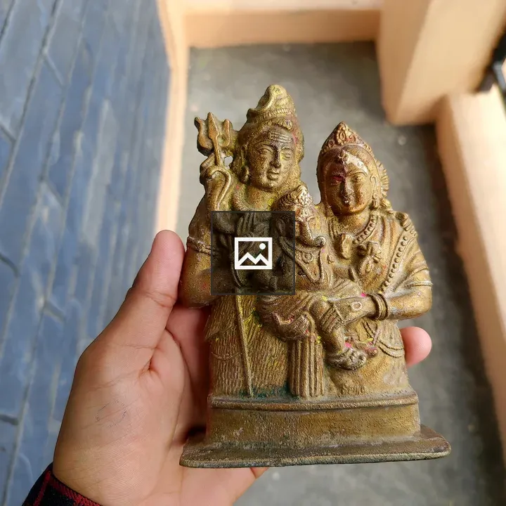 Statue of Two Figures in Hand