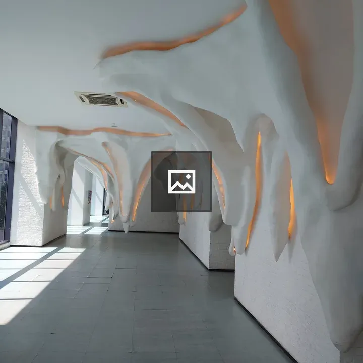 White Ceiling with Orange Lighting