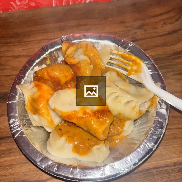 Dumplings in Orange Sauce