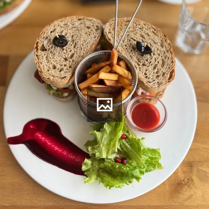 Sandwich on White Plate with Fries