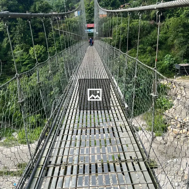 Small hanging bridge over river