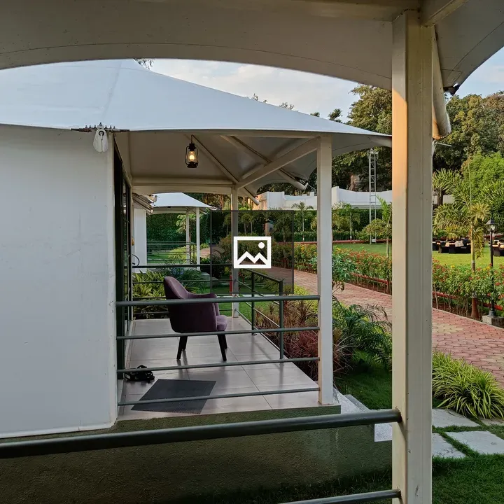 Covered porch with purple chair