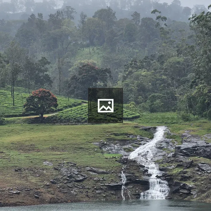 Waterfall in Foggy Morning