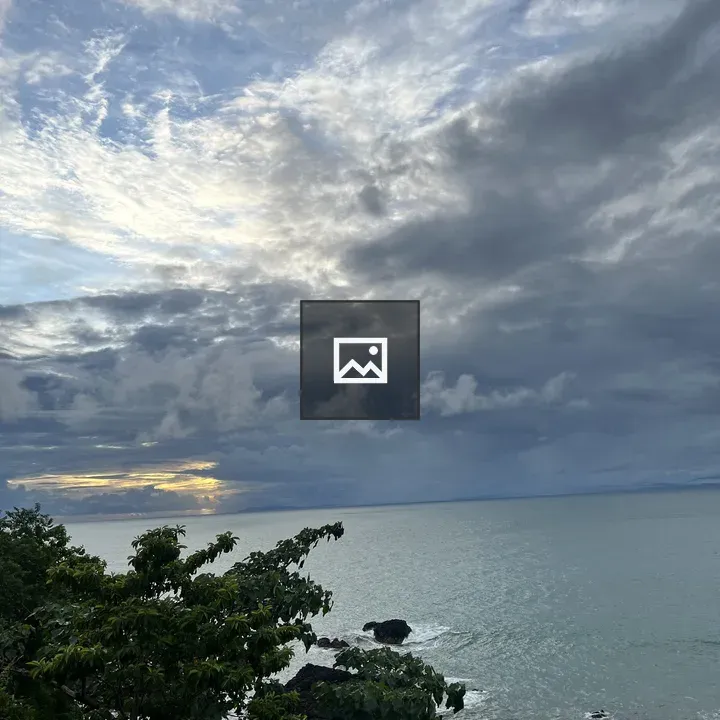 Coastal Scene with Cloudy Sky