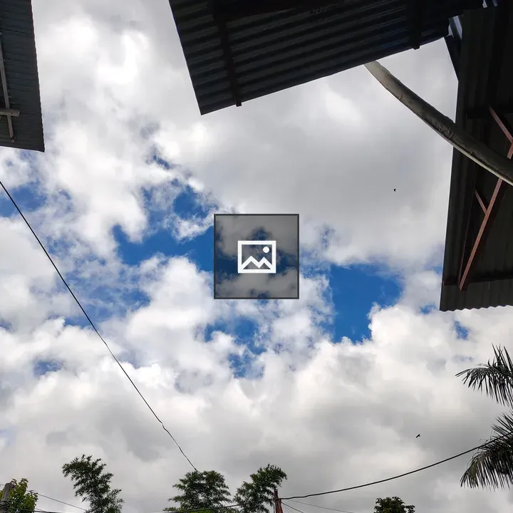 Sky view between metal roofs