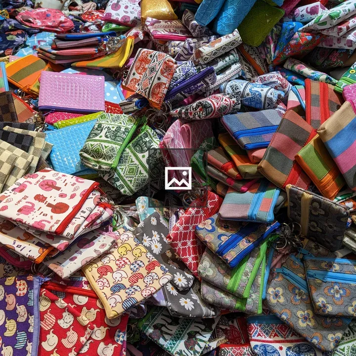 Colorful fabric pouches in piles