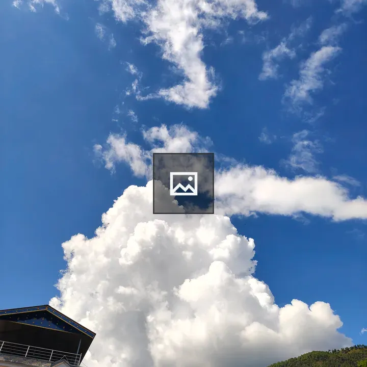 Blue Sky Over Green Mountains