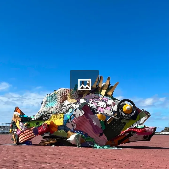 Sculpture of a Mero on Waterfront