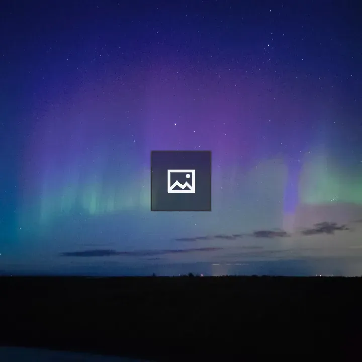 Northern Lights Over Night Sky