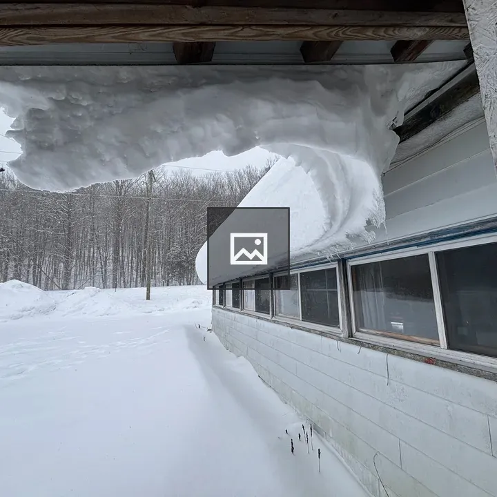 Snow on the Roof Edge