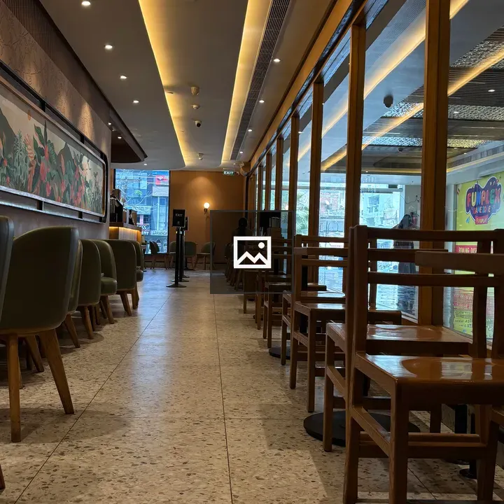 Modern café interior with seating rows