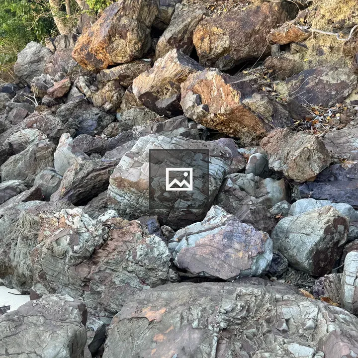 Piles of Rocks on Beach