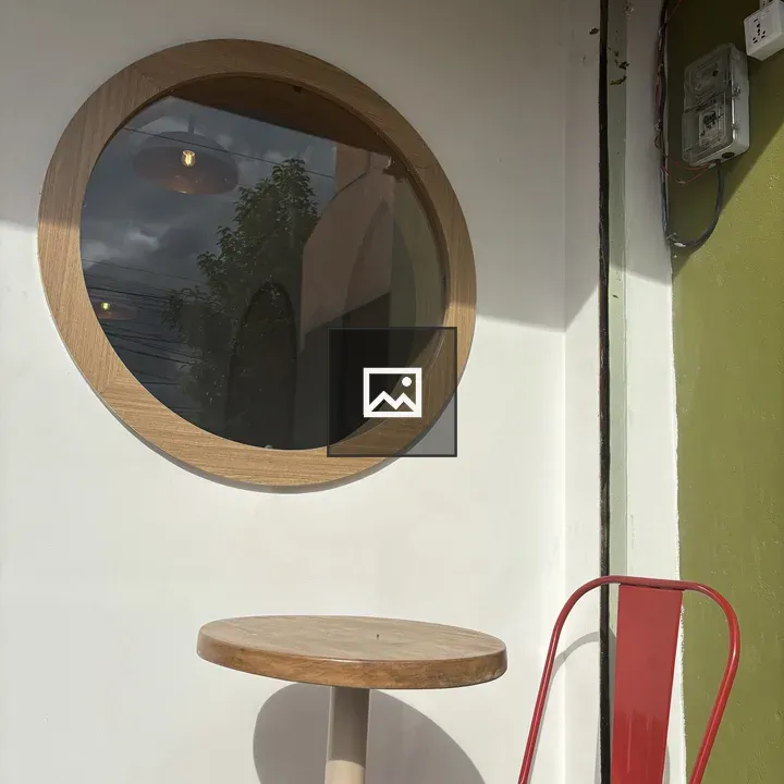 Round Wooden-Frame Window