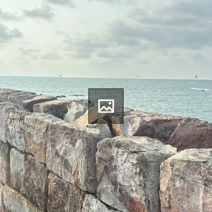 Stone Wall and Ocean Scene
