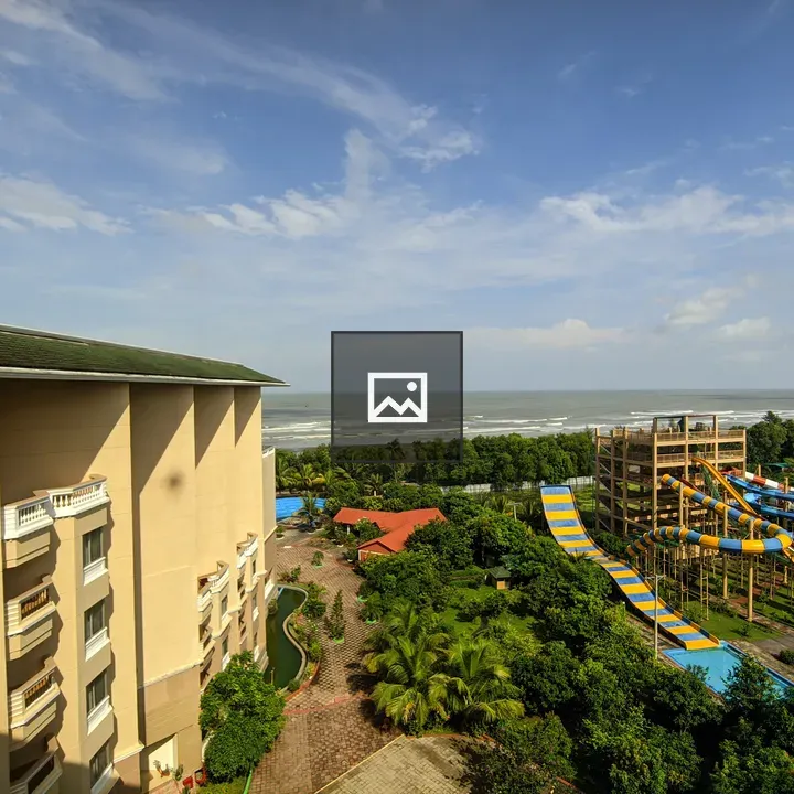 Seaside view with building and water park