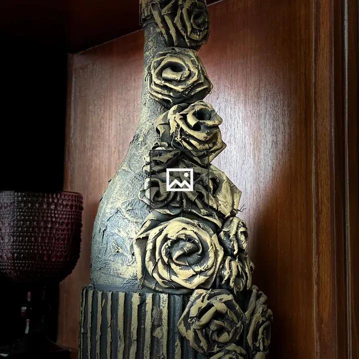 Decorative textured bottle with roses